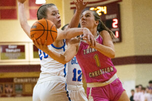 Trinity foiled by Gilmer County's press as Titans take opening game of Vision Homes Invitational